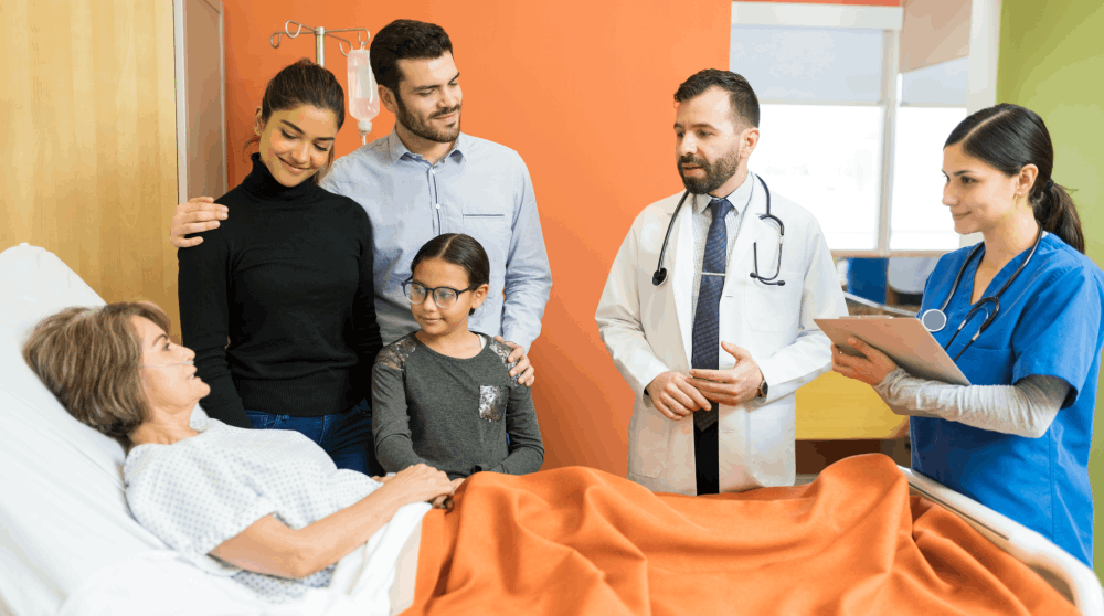 Doctors and nurses providing compassionate care to a patient with family support in a multispeciality hospital in Chennai
