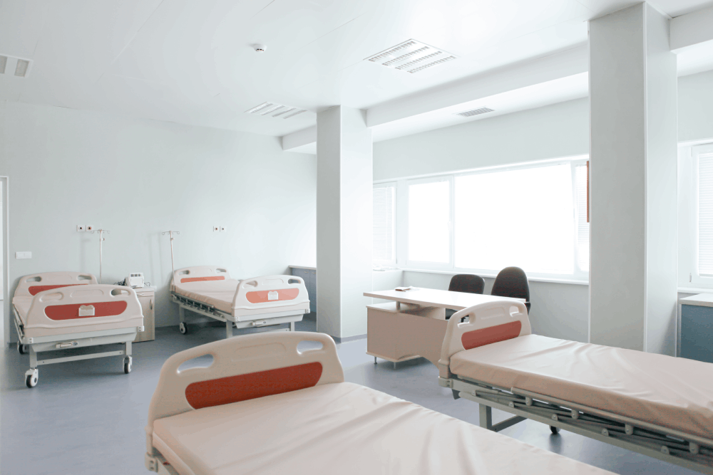 Clean and modern hospital ward with patient beds in Chennai